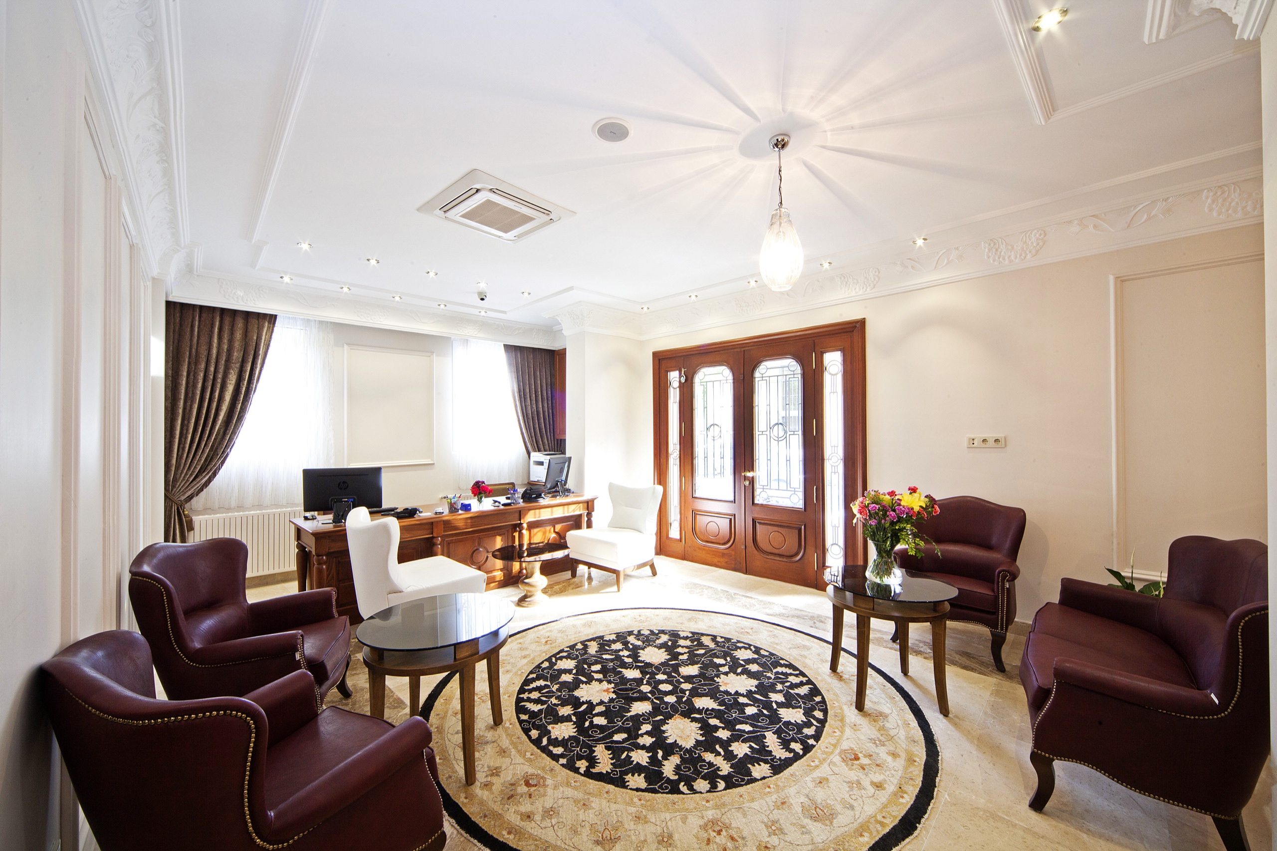 Aren Suites lobby with reception and seating