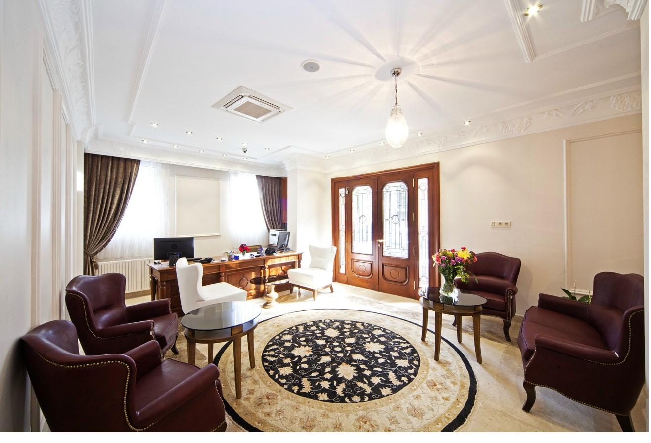 Reception desk with warm lighting and traditional decor